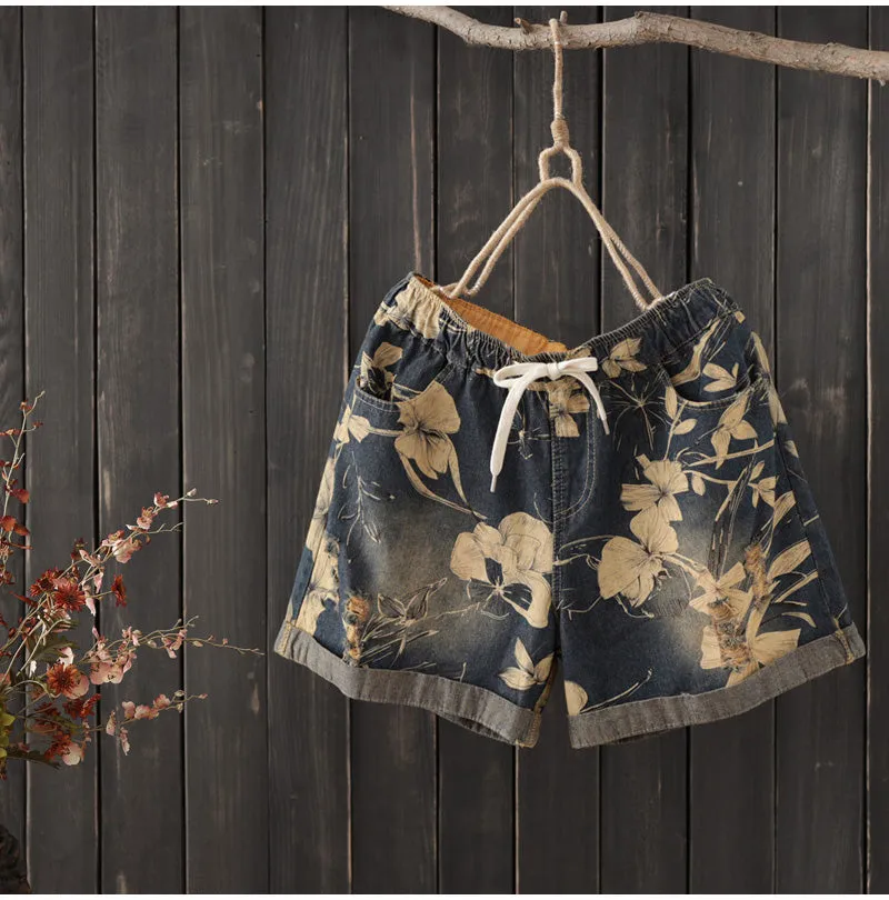 AUTUMN ROLL HEM DENIM SHORTS IN FLORAL PRINT   