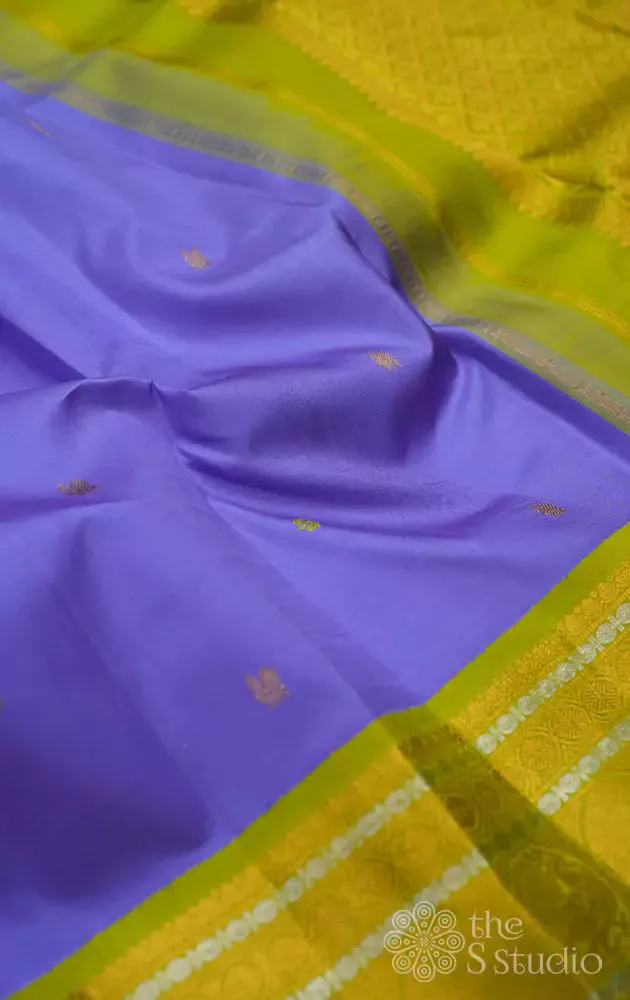 Lavender kanchipuram silk saree with small buttas and light green border