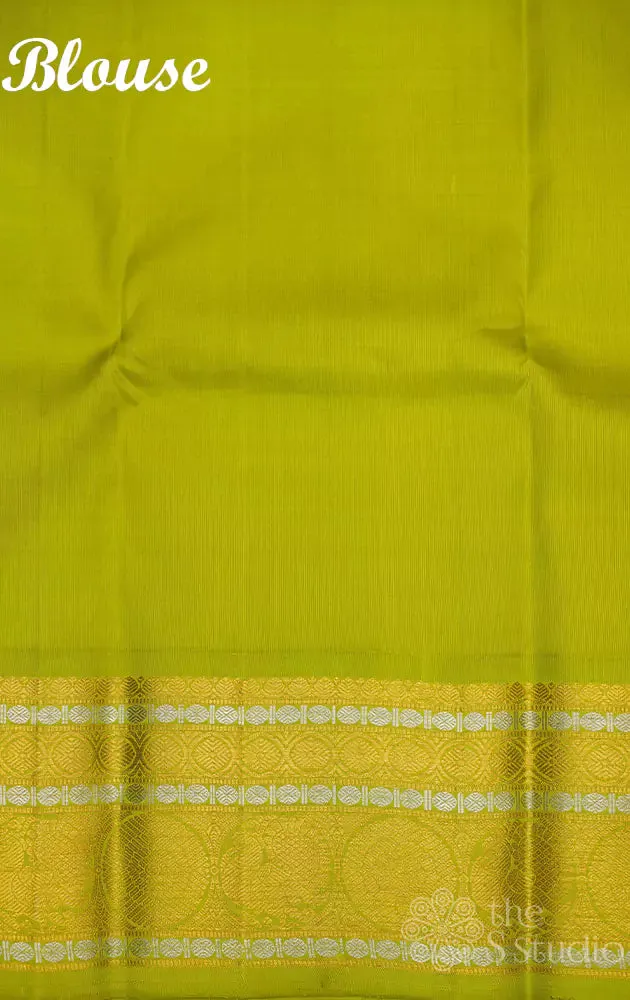 Lavender kanchipuram silk saree with small buttas and light green border
